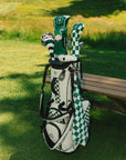 Knitted golf club head cover with a colorful pom-pom on a white background