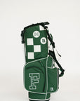Green and white checkered golf bag with visible branding on a light gray background