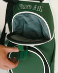 Green golf bag with 'Fore All' text on a white background