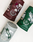Three leather driver covers with branding on a white background