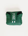 Green Mandy Mallet Cover with white text and designs on a white background