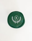 Green golf club head cover with a white logo on a white background