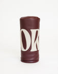 Merlot golf club head cover with a white 'FORE' logo on a white background