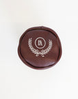Merlot golf club head cover with a white 'FORE' logo on a white background