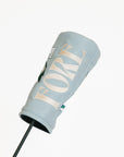 Smoke blue Kai golf club head cover with a logo on a white background