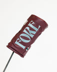 Merlot Kai golf club head cover with a logo on a white background