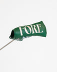 Green golf club head cover with decorative patterns on a white background