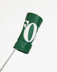 Green golf club head cover with a white logo on a white background