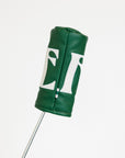 Green golf club head cover with a white logo on a white background