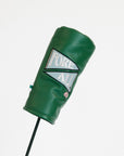 Green Kai driver golf club head cover with branding on a white background