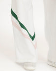 White pants with green and pink stripes on a white background