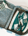 Blue and white striped shoe bag with 'FORE' text on a white background