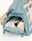 Striped Boston bag with 'FORE' text on a white background