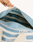 Striped Boston bag with 'FORE' text on a white background