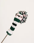 Knitted golf club head cover with a colorful pom-pom on a white background