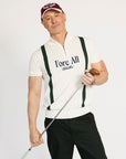 A man wearing a beige zip sweater with vertical green stripes and the text 'Fore All x Khalhon' on the chest.
