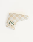 Golf club head cover with checkered pattern and logo on a white background