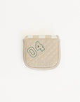 Beige quilted mallet cover with a green logo on a white background