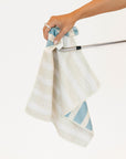 Striped towel with 'FORE' text on a white background