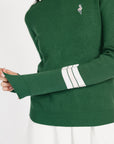 Green sweater with white stripes on sleeves against a white background