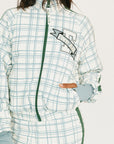 Person wearing a smoke blue and white plaid Lyla Jacket on a white background