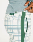 Green and white plaid pants with a visible Fore All label on a plain background
