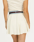 Angora Brooklyn skirt with a colorful waistband and 'Fore All' brand logo on a white background
