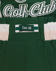 A pair of color-blocked green and white warm-up pants with a pink stripe, featuring a flat drawstring waistband and deep front pockets, branded with the 'Fore All' detail on the back and an FA icon on the inner calf.
