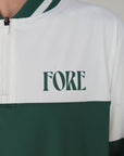 "Close-up of the 'Hamilton Quarter Zip' from the Royal Collection, inspired by autumn hues. This men's quarter zip features complementary color blocking and a convenient zip for easy wear. Made from breathable material, it offers warmth and freedom of movement, ideal for the course and elevating your fall wardrobe with both style and functionality."