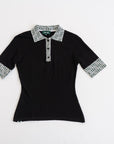 cute women’s golf pants that are pink on a white back ground. Styled with black golf polo.