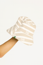 Beige and white striped bucket hat with 'FORE' branding held by a person on a white background