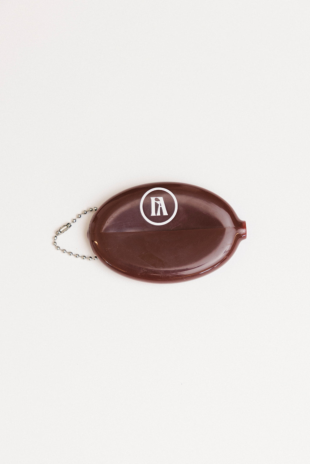 Brown pouch with 'RANGE MONEY' text on a white background