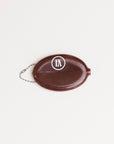 Brown pouch with 'RANGE MONEY' text on a white background