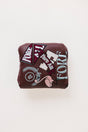 Merlot Mandy Mallet Cover with white text and designs on a white background
