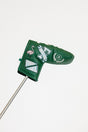Green golf club head cover with decorative patterns on a white background