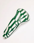 Green and white golf headcover on a white background.