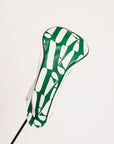 Green and white golf headcover on a white background.