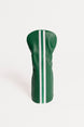 Green golf club head cover with white stripes on a white background