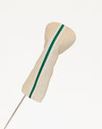 Beige golf club head cover with green stripe on a white background