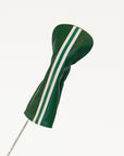 Green golf club head cover with white stripes on a white background