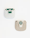 Two mallet covers with a smiley face design on a white background