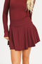 Merlot Marie long-sleeve top and Manhattan skirt set on a white background