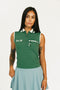 Woman wearing a green sleeveless golf polo with 'Fore All' text on a white background