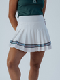 White pleated skirt with blue stripes worn by a person on a plain background