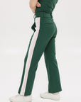 A pair of green Simone Pant with white stripes on the side, front and back pockets, and a zipper fly with snap closure.